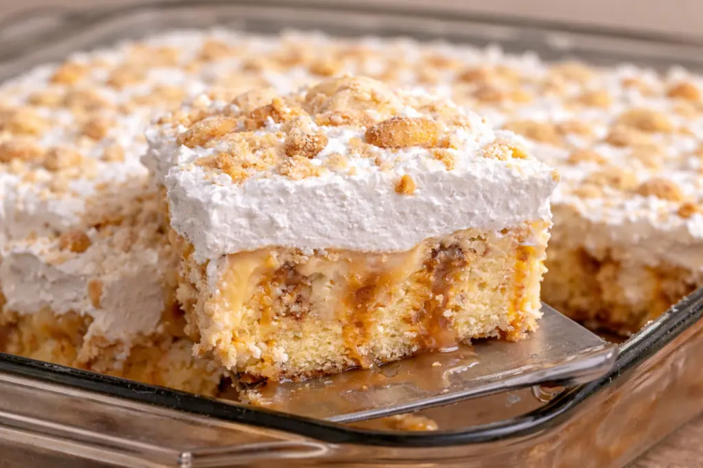 Banana caramel poke cake slice