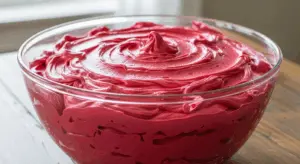 creamy red-colored butter frosting