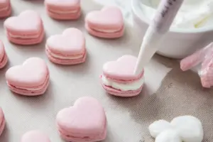 pink heart-shaped Macarons with filling