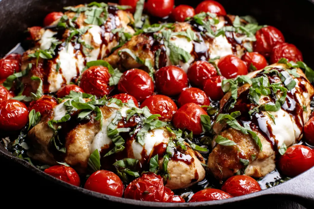 baked caprese chicken with melted mozzarella