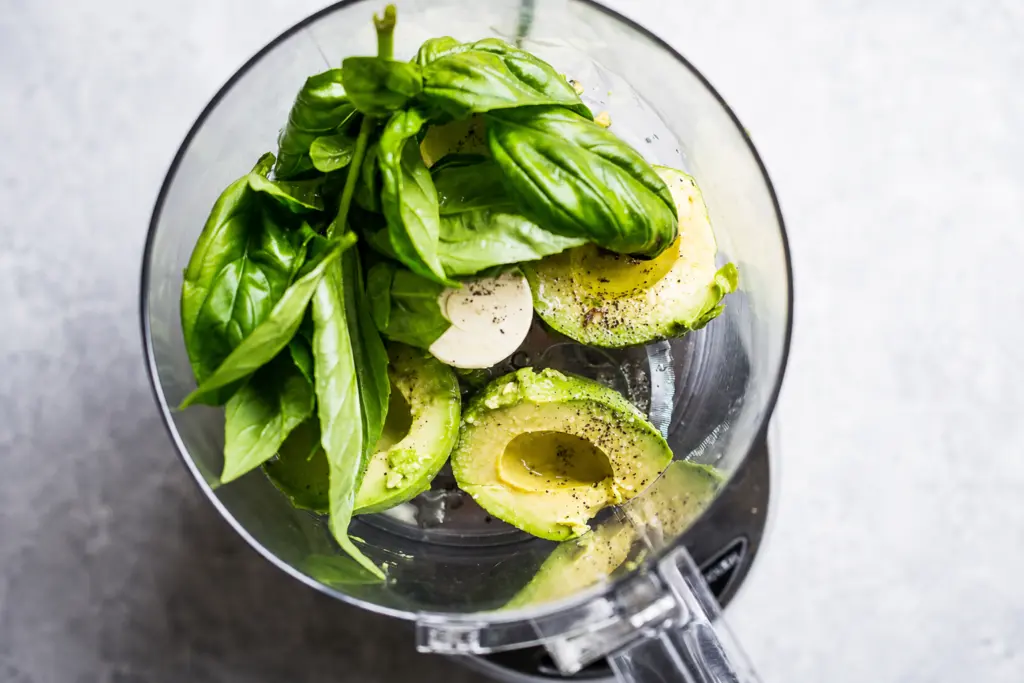 Creamy Avocado Basil Pasta with Corn and Tomatoes 3 Fresh avocado and basil prep for avocado basil pasta