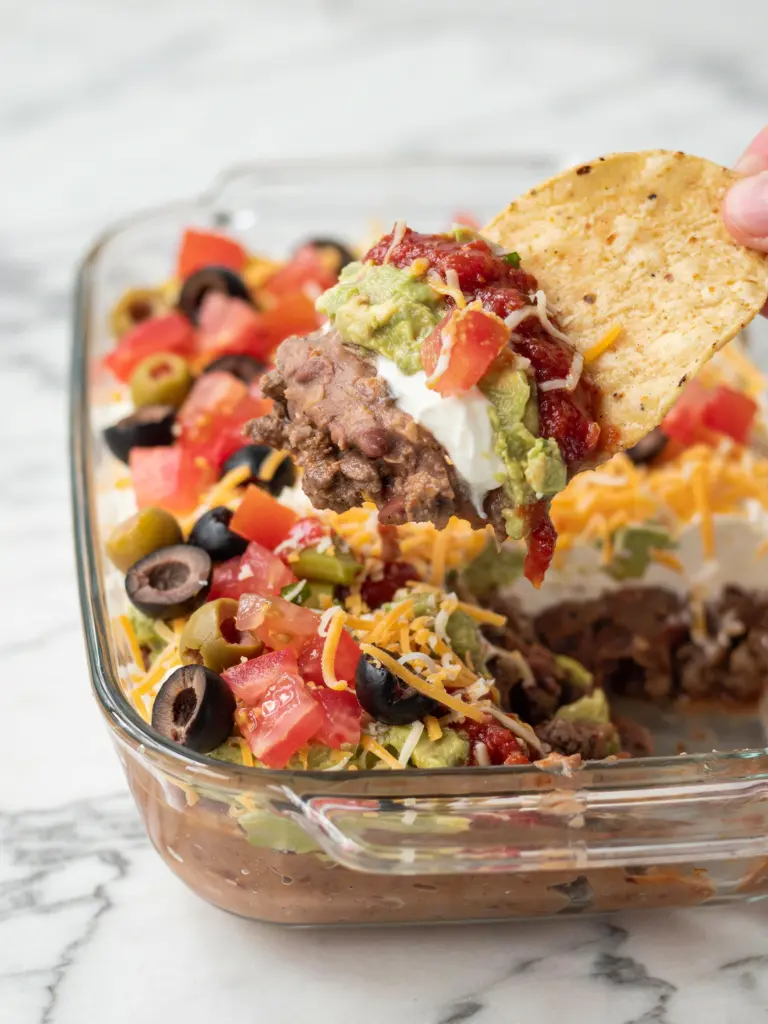 Delicious 7 layer taco dip Recipe 6 High-Protein Layered Taco Dip with Ground Beef