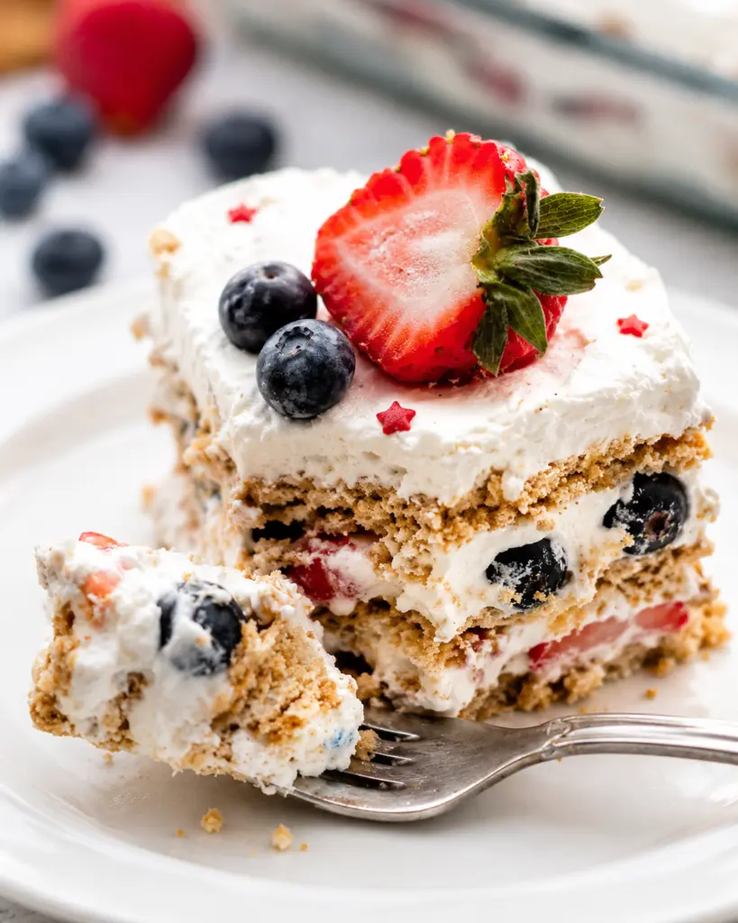 Serving Berry Icebox Cake slice