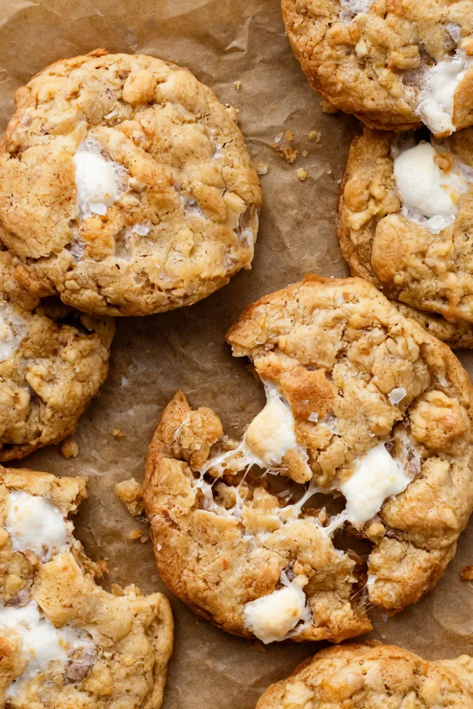Brown Butter Marshmallow Crispy Cookies Recipe 5 Gooey Marshmallow Crispy Cookies on Parchment